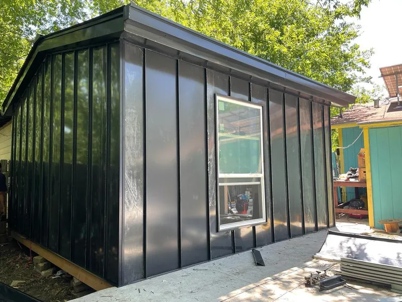 Black standing seam metal wall panels for Metal Roof Installation in Salisbury